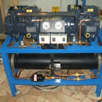 1. Gruppo frigorifero con condensatore ad acqua dolce e 2 compressori DORIN, uno di riserva all'altro, per condizionamento Sala Controllo Quadri